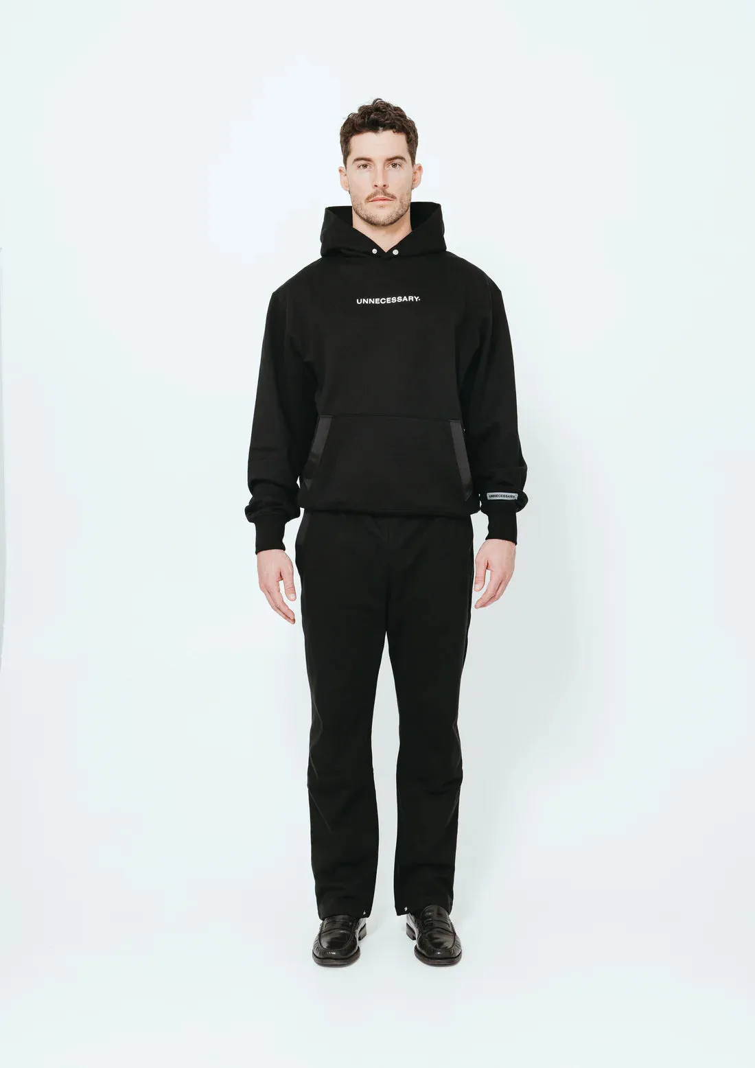 UNNECESSARY Logo Hoodie Black