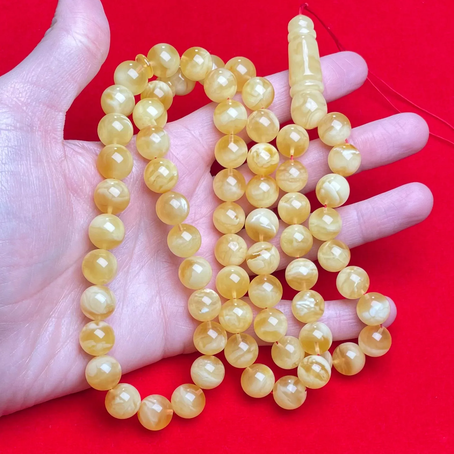 *YELLOW/WHITE AMBER MISBAHA 11,7mm 64g