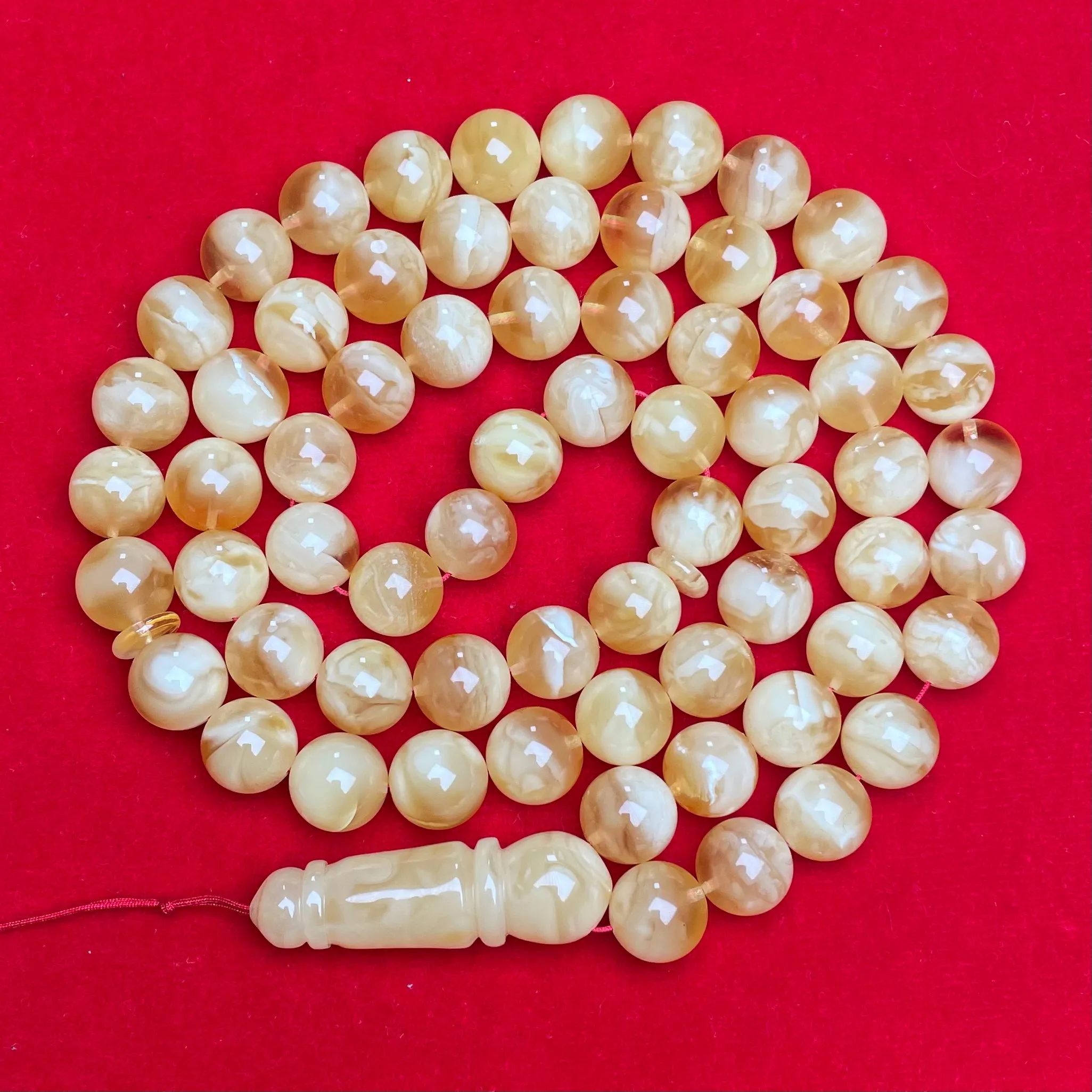 *YELLOW/WHITE AMBER MISBAHA 11,7mm 64g